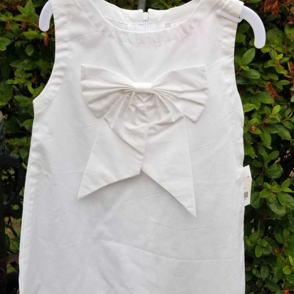White bow dress by Frumpy Rumps